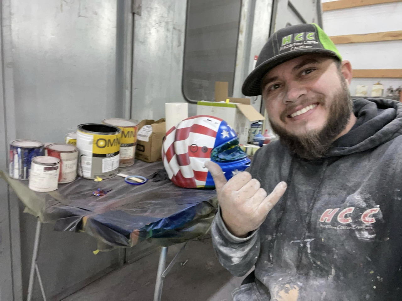 The owner of Howerton's Custom Creations in the shop