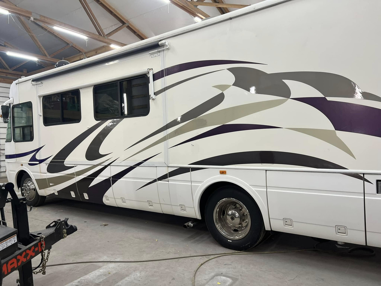 Motorhome refinished with new graphics — after
