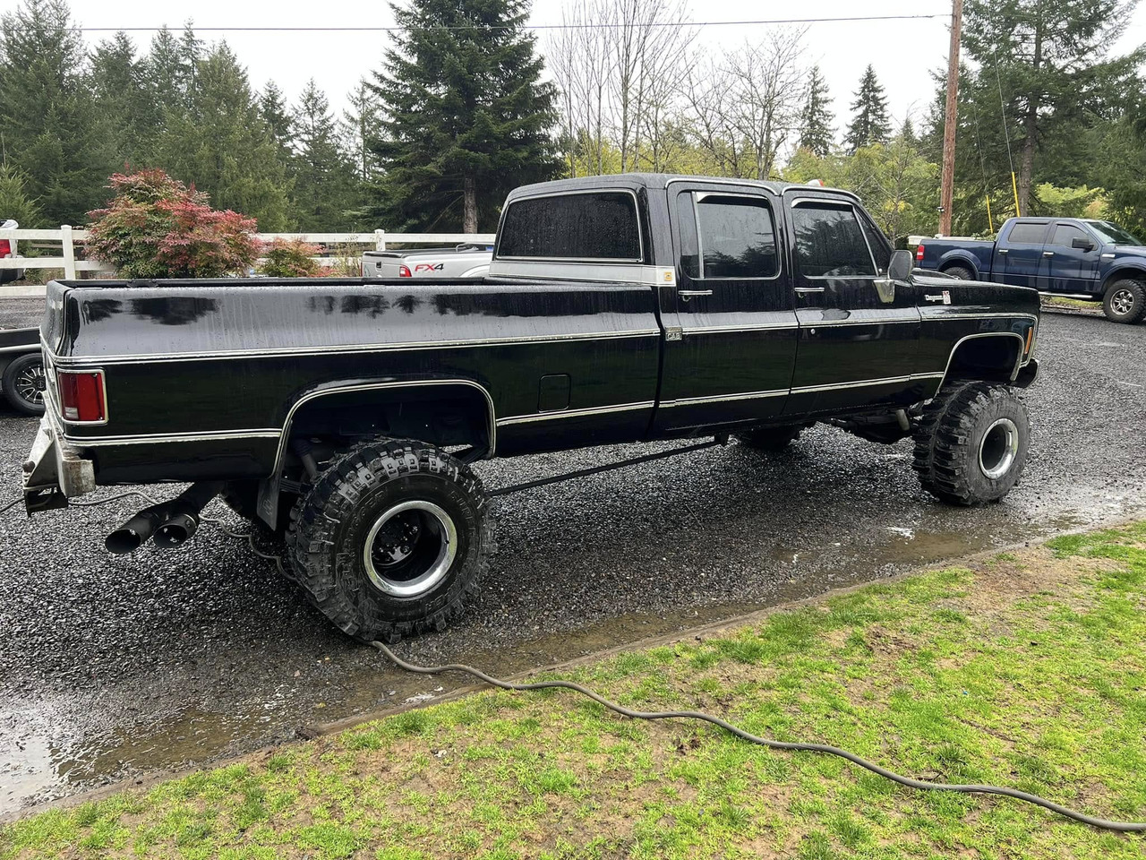 Square-body truck painted and lifted — after