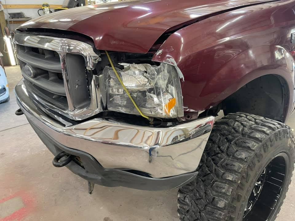 Truck front end disassembled for structural repair at Howerton's Custom Creations